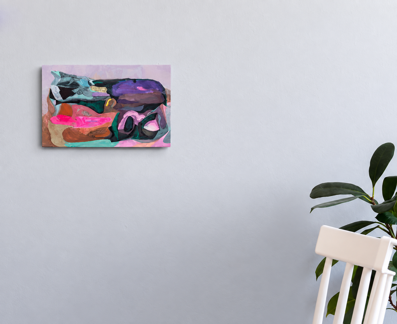 Painting by Aleksandar Oklobdžija on a pale wall beside a plant and a white chair